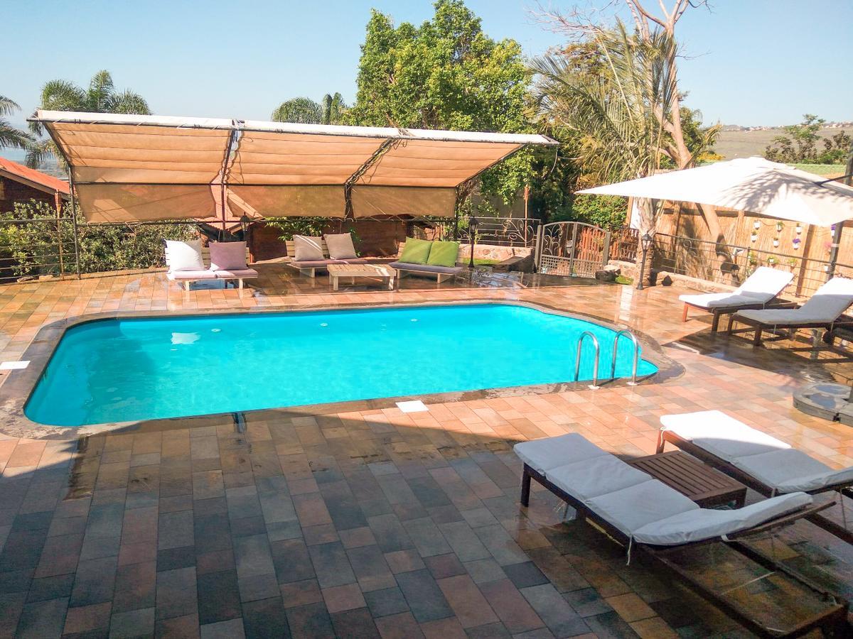 כחול ירוק בכפר Villa Had Nes Bagian luar foto